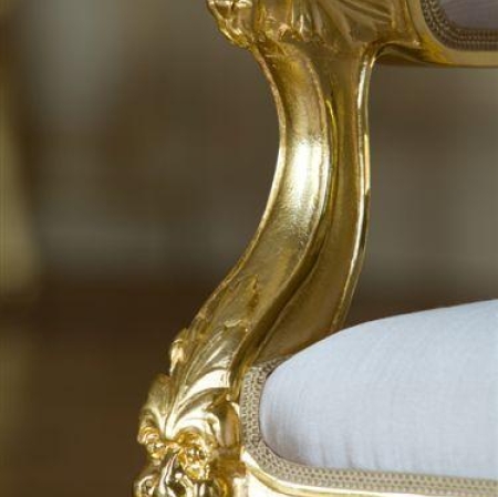 Gold decoration of the armchair
