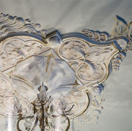 A richly decorated bright ceiling