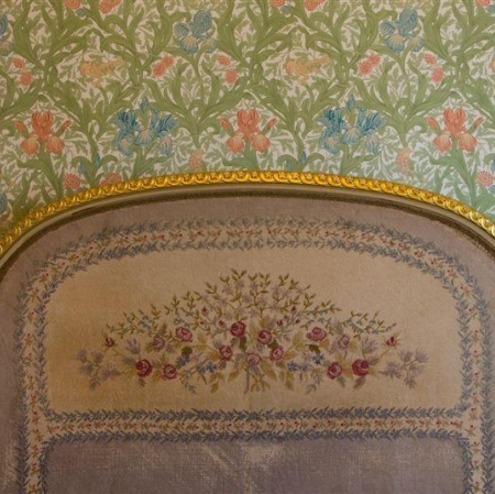 Richly decorated bed headboard
