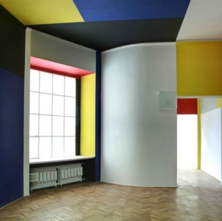 Neoplastic Room, wooden floor, walls painted in blue, red, yellow, white and black