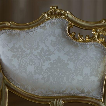 Rich decorations on a bright armchair
