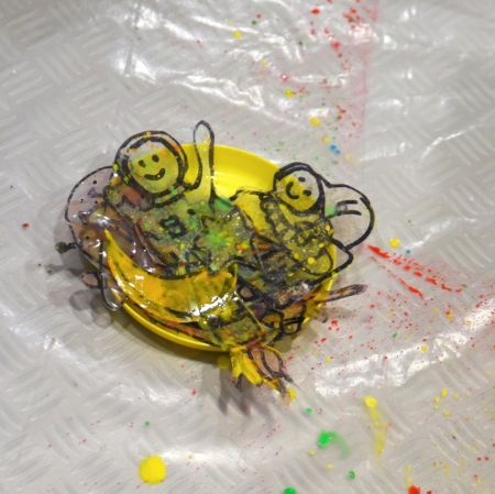 a yellow bowl with tracing templates in it