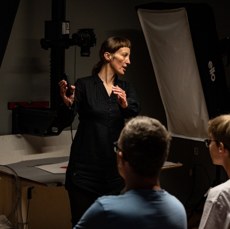 A person standing in front of the audience