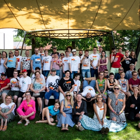 Group photo of people in the garden