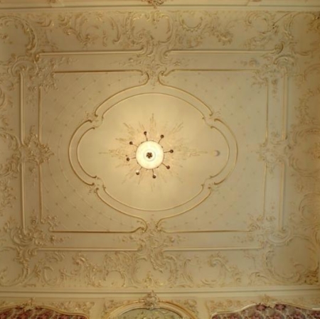 Richly decorated bright ceiling
