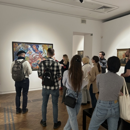 a dozen or so people in the exhibition space