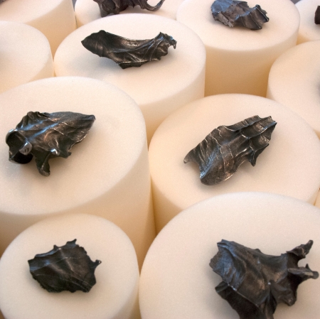 Anetta Mona Chisa and Lucia Tkacova, "Things in Our Hands", 2014, sculpture: melted eurocoins, foam cylinders, courtesy of the artist