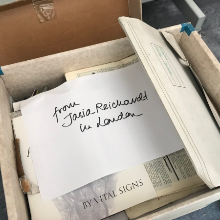 Photo of the documents in the cardboard box