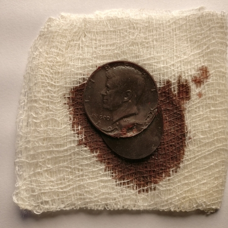 Blood Money, 1968, acrylic medium, artist’s blood, gauze