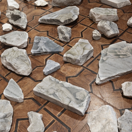 a dozen stones spread out on the floor