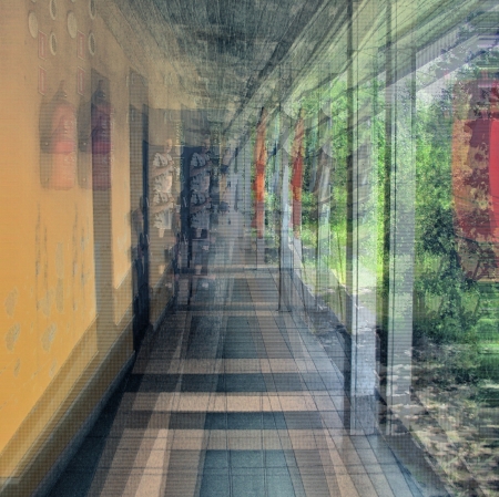 blurred photograph showing a section of a corridor